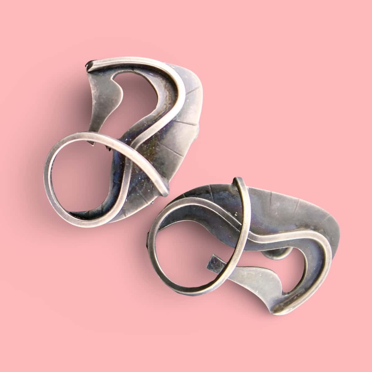 Pair of Silver earrings by Paul Lobel